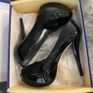 Stuart Weitzman peep toe pumps